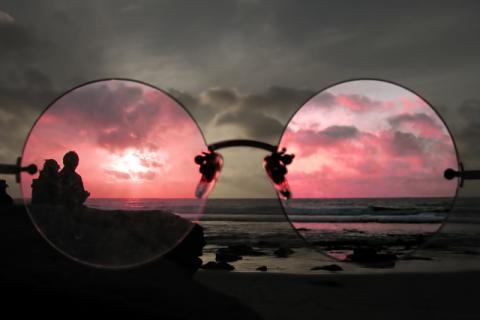 View of a beach through rose tinted spectacles