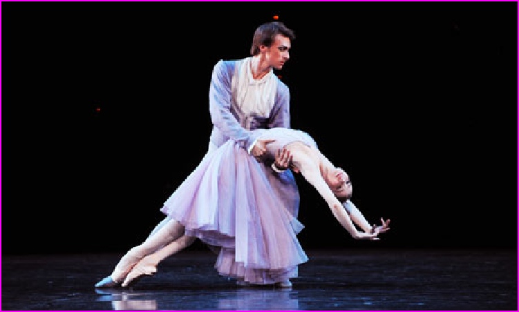 Photograph of two ballet dancers in a striking pose